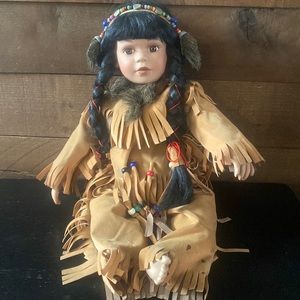 Porcelain Native American girl doll